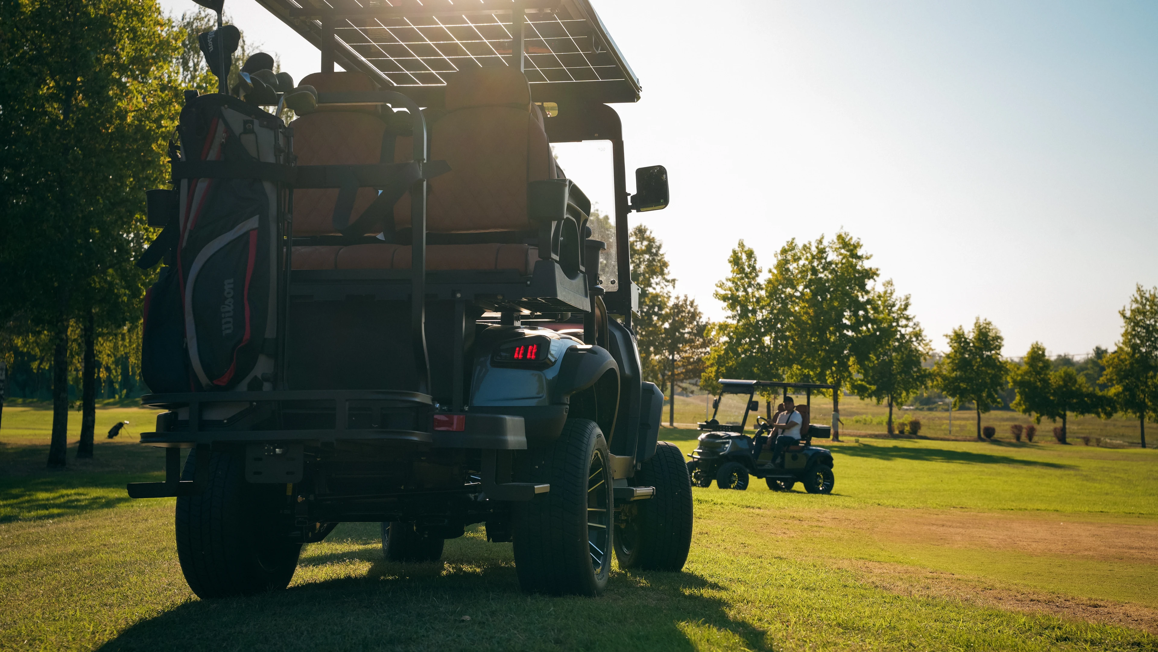 Golf Shuttle Elite 2 + 2 — solar roof and golf equipment