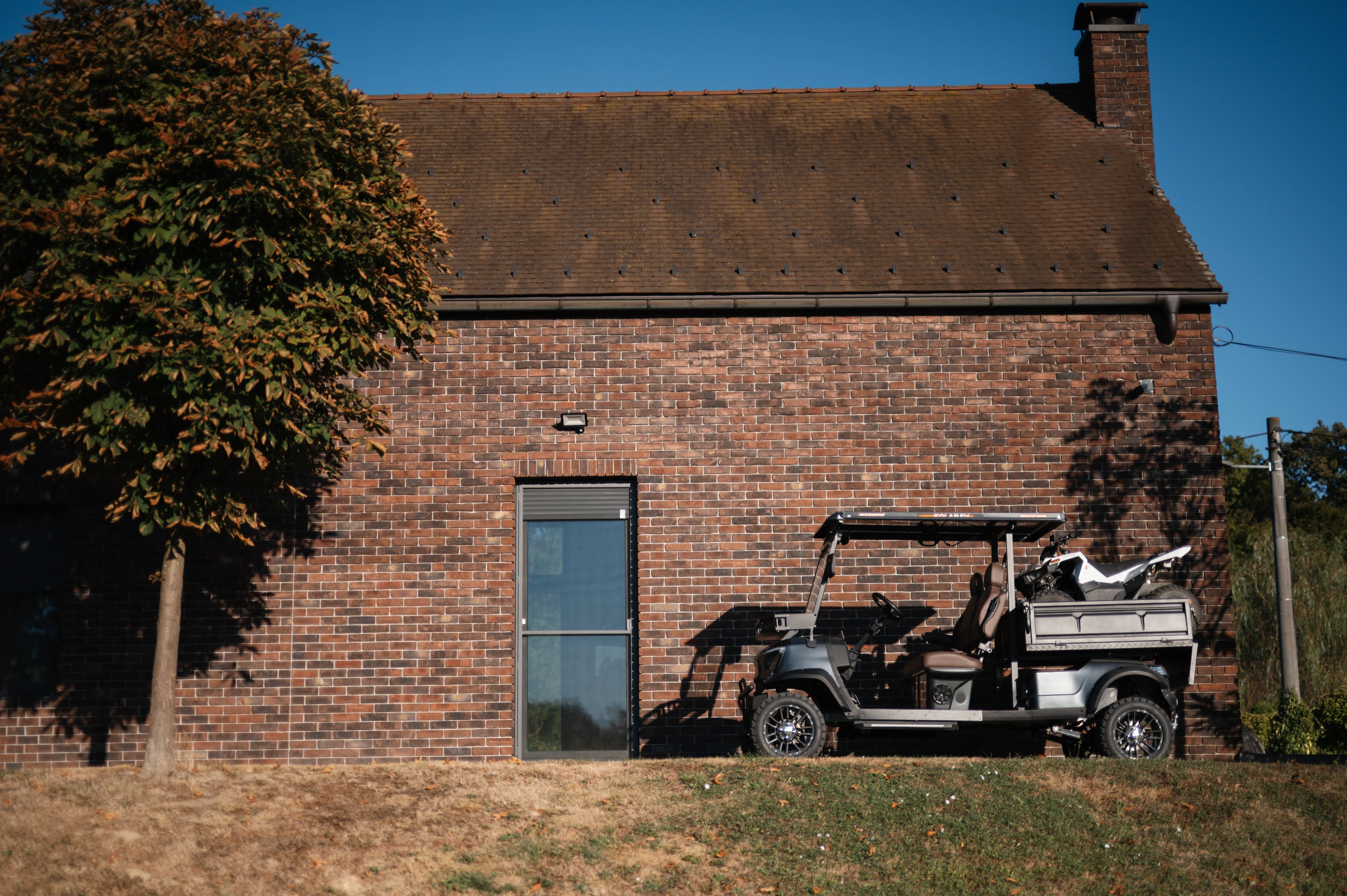 Cargo Professional — by the stone building