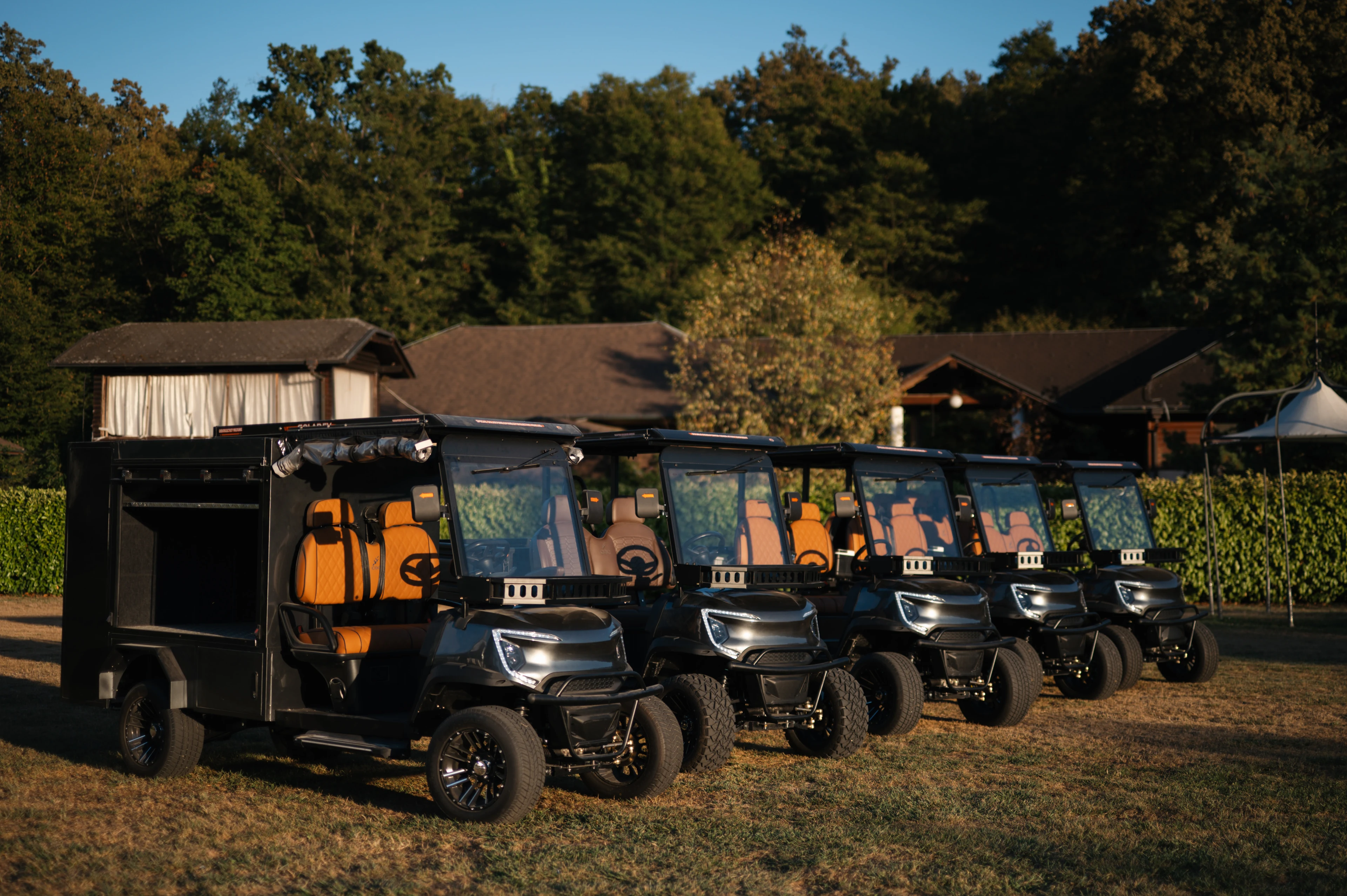 Five CGC vehicles together — passenger and utility configurations